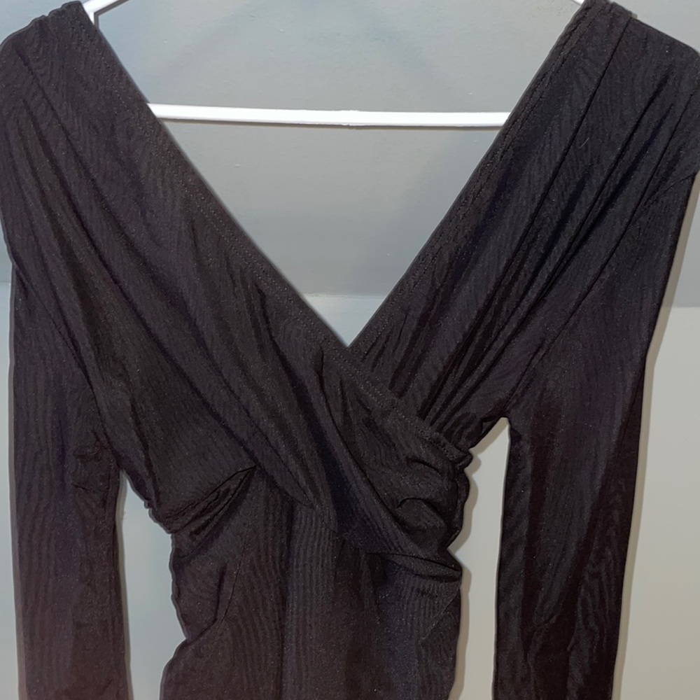 Black long sleeved body suit